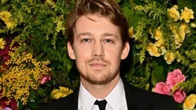 Joe Alwyn Is ‘Dating and Happy' a Year After Taylor Swift Breakup, Sources Say - www.glamour.com - county Stone