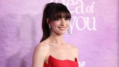 Anne Hathaway Just Proved that Bright Red Is 100% Her Color - www.glamour.com - New York