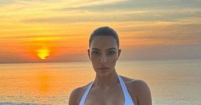 Inside Kim Kardashian's tropical getaway as she stuns in bikini and spots dolphins during boat trip - www.ok.co.uk