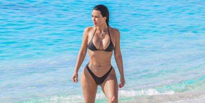 Kim Kardashian Spotted in Tiny Black Bikini During Turks & Caicos Vacation with Khloe & Family - www.justjared.com - Texas