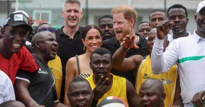 Meghan Markle and Prince Harry beam as they hold hands on second day of Nigeria tour - www.dailyrecord.co.uk - Germany - Nigeria