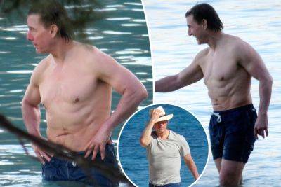 Shirtless Tom Cruise, 61, shows off abs at beach on break from filming ‘Mission: Impossible 8’ - nypost.com - Britain - Spain - Norway