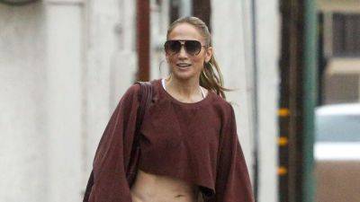 Jennifer Lopez Is All Smiles in Ultra-Low Rise Sweatpants Amid Ben Affleck Divorce Rumors - www.glamour.com - Paris - Los Angeles - California - Las Vegas