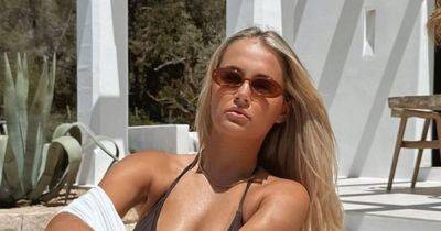 Molly-Mae Hague puts engagement ring back on in bikini snaps amid Tommy Fury split rumours - www.ok.co.uk - Hague