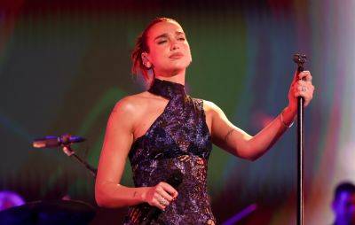Dua Lipa forced to change choreography after slipping on sweat - www.nme.com - county Hall - city Milan - county Love
