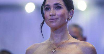 Meghan Markle wears cross necklace which belonged to Princess Diana - but experts 'never saw her wear it' - www.dailyrecord.co.uk - Scotland - New York - Nigeria - city Abuja