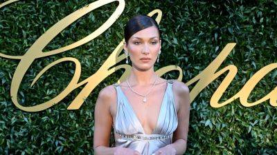 Bella Hadid Took Cannes 2024 Back in Time to 2006 in a Vintage Silver Gown - www.glamour.com