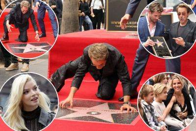 Robert Downey Jr. playfully attempts to steal Chris Hemsworth’s Hollywood star: photos - nypost.com - Los Angeles