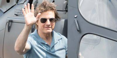 Tom Cruise Hops Into His Helicopter & Head Off on a New Adventure - www.justjared.com - London