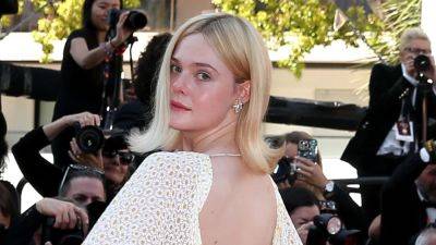 Elle Fanning Went Full Flower Child in a Sheer Backless Dress at Cannes - www.glamour.com - Hollywood - Italy