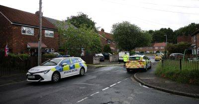 Tears as neighbours speak of terror after gunman opens fire on Salford estate - www.manchestereveningnews.co.uk - Manchester
