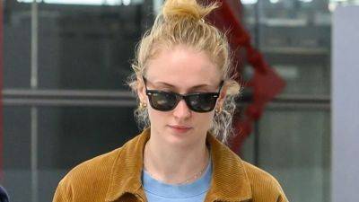Sophie Turner Adds an Edge to Her Cozy Airport Outfit With Playboy Merch - www.glamour.com