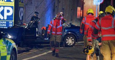 Emergency services slice car in half to rescue man before arresting him - www.manchestereveningnews.co.uk - Manchester