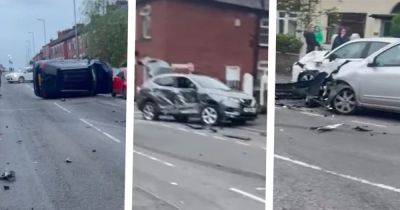 Pile-up after car speeds down street before driver runs off - www.manchestereveningnews.co.uk - Manchester