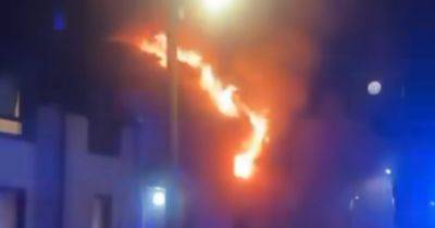 Man arrested after huge fire rips through Scots home as four properties evacuated - www.dailyrecord.co.uk - Scotland