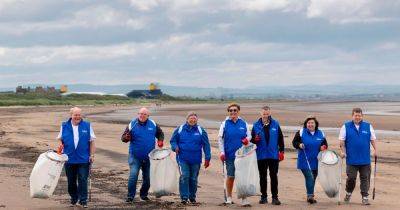 Lottery winners worth almost £100m go litter picking on Ayrshire beach - www.dailyrecord.co.uk - Scotland