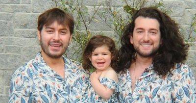 Brian Dowling and partner Arthur twin with daughter in matching M&S summer outfits - www.ok.co.uk - Cuba - county Cotton