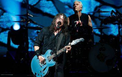 Dave Grohl sips Buckfast and duets with daughter Violet as Foo Fighters’ UK tour hits Glasgow - www.nme.com - Britain - Scotland - Manchester - county Hampden