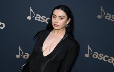 Charli XCX admits that she “never really felt accepted” in the British music scene - www.nme.com - Britain