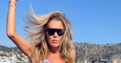 Amanda Holden, 53, branded 'stunning' by fans as she poses on yacht in tiny bikini - www.ok.co.uk