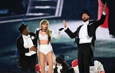 Travis Kelce Joins Taylor Swift on Stage for Surprise ‘Eras Tour’ Appearance and Literally Sweeps Her Off Her Feet - variety.com - Kansas City