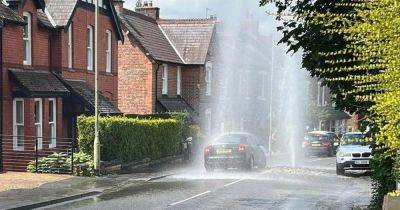 ‘I’ve never seen anything like it in my entire life’: Huge jet of water covers road after water pipe bursts - www.manchestereveningnews.co.uk - county Lane