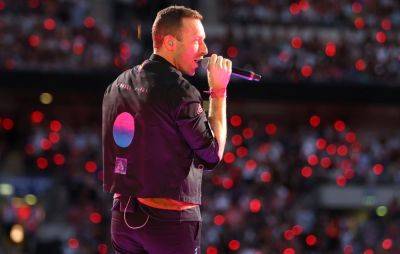 Glastonbury 2024: Chris Martin apparently handing out LED wristbands for Coldplay’s headline show tonight - www.nme.com