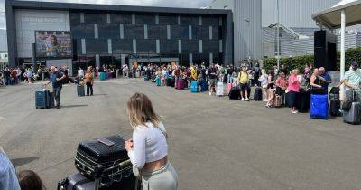 Edinburgh Airport chaos as massive queues to check-in snake outside building - www.dailyrecord.co.uk - Tunisia - Beyond