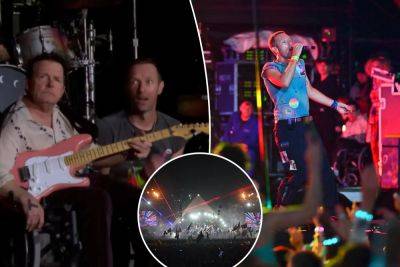 Michael J Fox surprises fans, joins Coldplay on guitar during historic Glastonbury performance: ‘Our hero’ - nypost.com