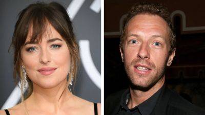 Dakota Johnson Spotted at Chris Martin's Coldplay Concert Amid Confusing Relationship Reports - www.glamour.com - Mexico