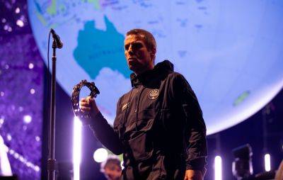 Liam Gallagher says Noel is “still playing hard to get” at ‘Definitely Maybe’ show - www.nme.com - Britain - Ireland
