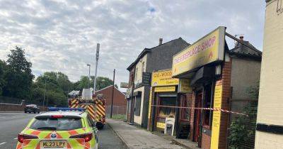 Emergency services descend on fireplace shop after blaze breaks out with cordon in place - www.manchestereveningnews.co.uk - Manchester